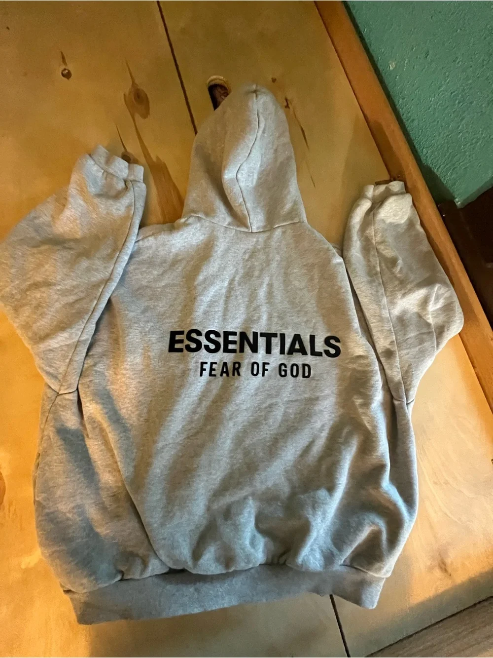 Essentials Light Gray Pullover Hoodie with Chest Logo